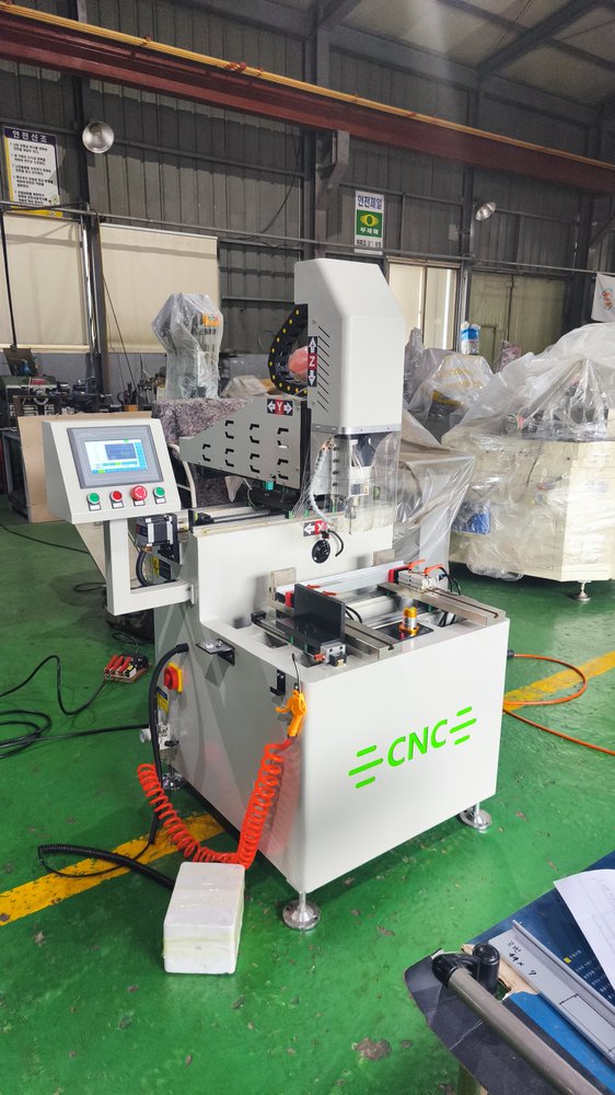 CNC400에 자재 고정